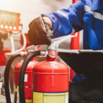 Engineer check fire suppression system,check fire extinguisher tank in the fire control room for safety. (Getty Image)