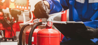 Engineer check fire suppression system,check fire extinguisher tank in the fire control room for safety. (Getty Image)