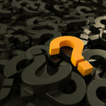 Orange colored question mark in the middle of black ones. ( 3d render )