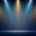 Bright beams of spotlights on a blue stage