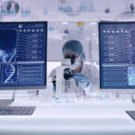 Scientist examines DNA models in modern Genetic Research Laboratory.